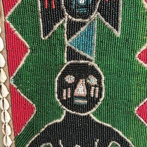 Flawless hand beaded Native American wall hanging.